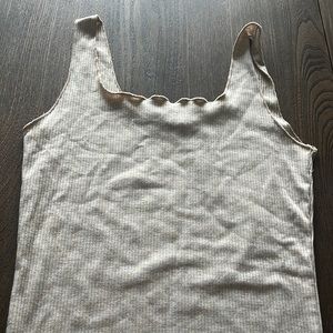Tank top lettuce hem
